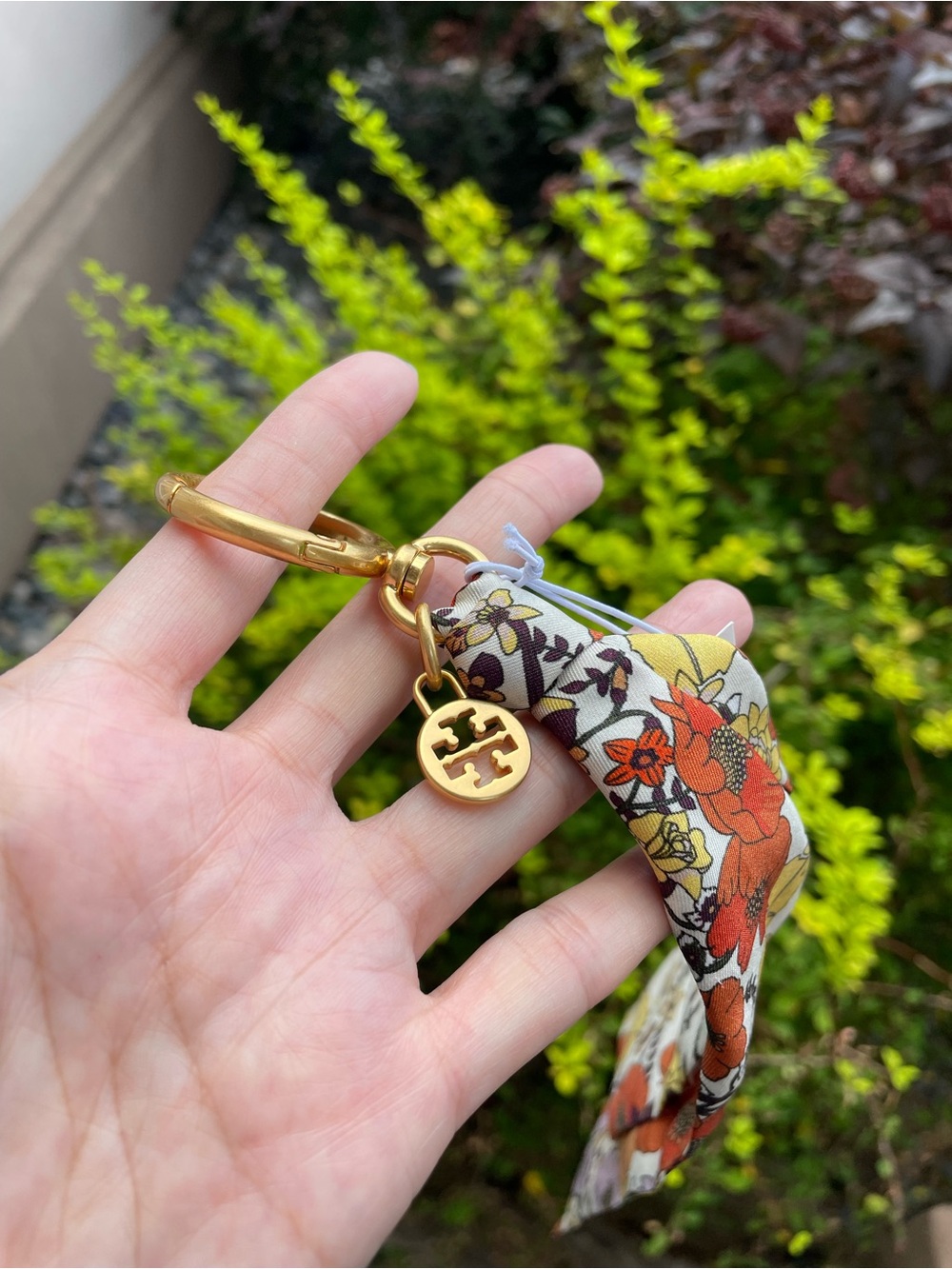 Tory Burch Gold Logo Floral Scarf Keychain - Yellow & Orange